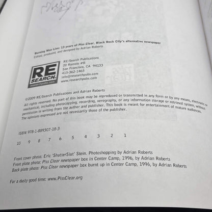 Burning Man Live: 13 Years of Piss Clear – Adrian Roberts – Signed First Printing